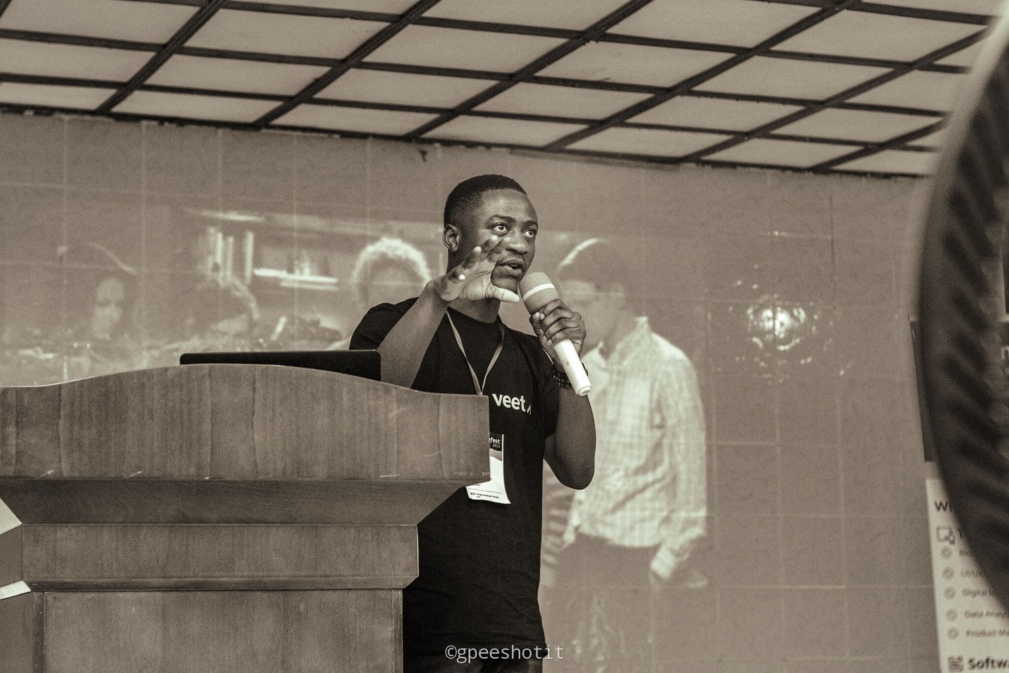 Ejiro Asiuwhu speaking at DevFest
